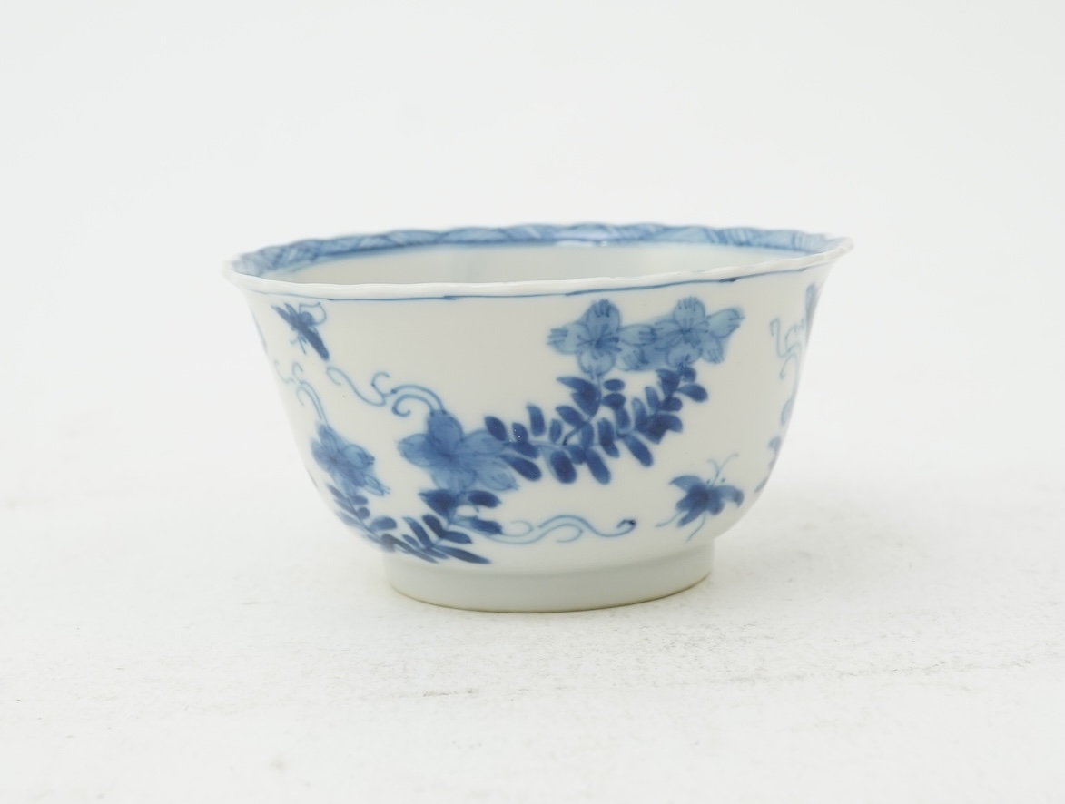 A Chinese blue and white tea bowl and saucer, Kangxi period